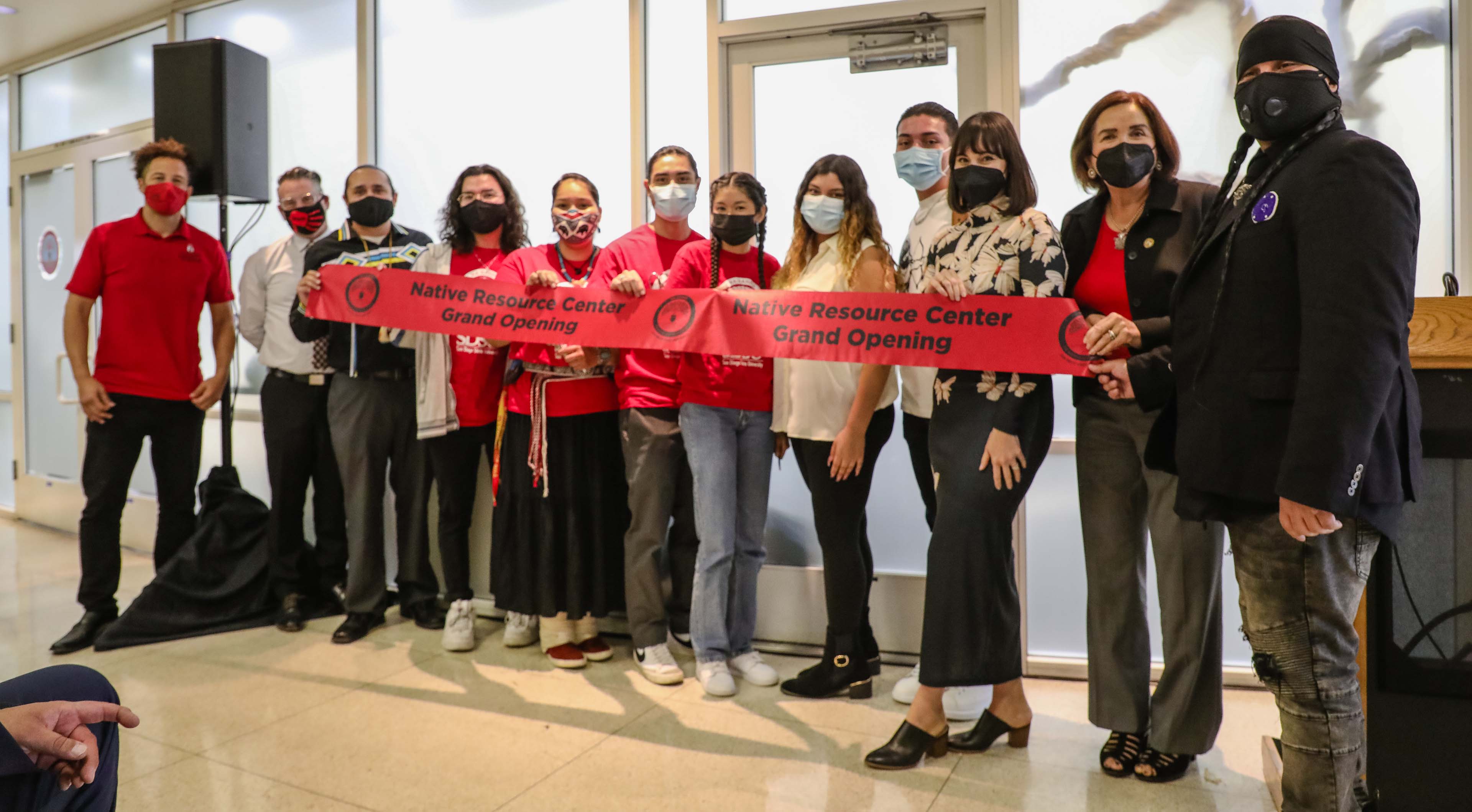 SDSU President Adela de la Torre and tribal liaison Jacob Alvarado Waipuk (far right) attended the opening of the Native Resource Center. See footnote for complete list. (Photo: Scott Hargrove)