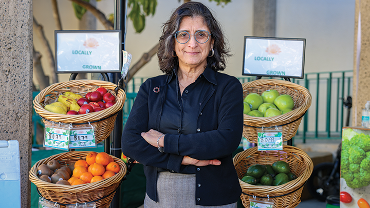 Guadalupe “Suchi” Ayala at SDSU’s BrightSide Produce stand, January 2024. (Photo By Rachel Crawford)