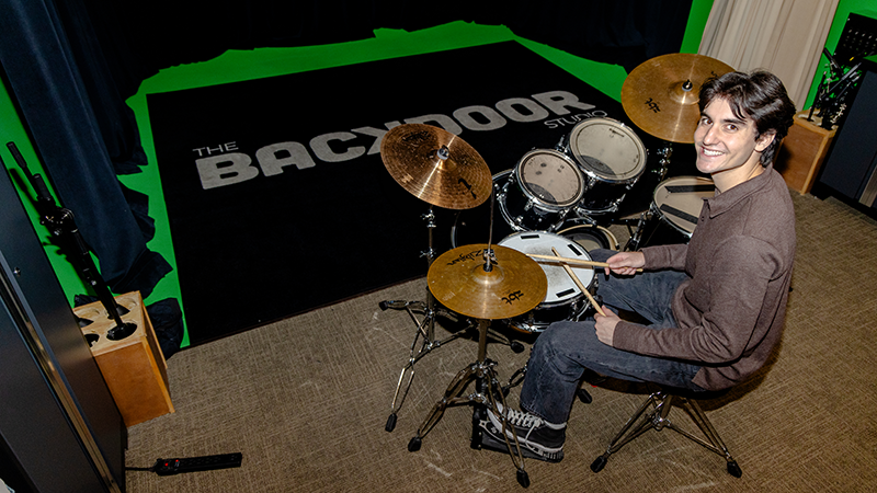 Mark Heine working in the Backdoor Studio at SDSU. (Ky Marlin/SDSU)